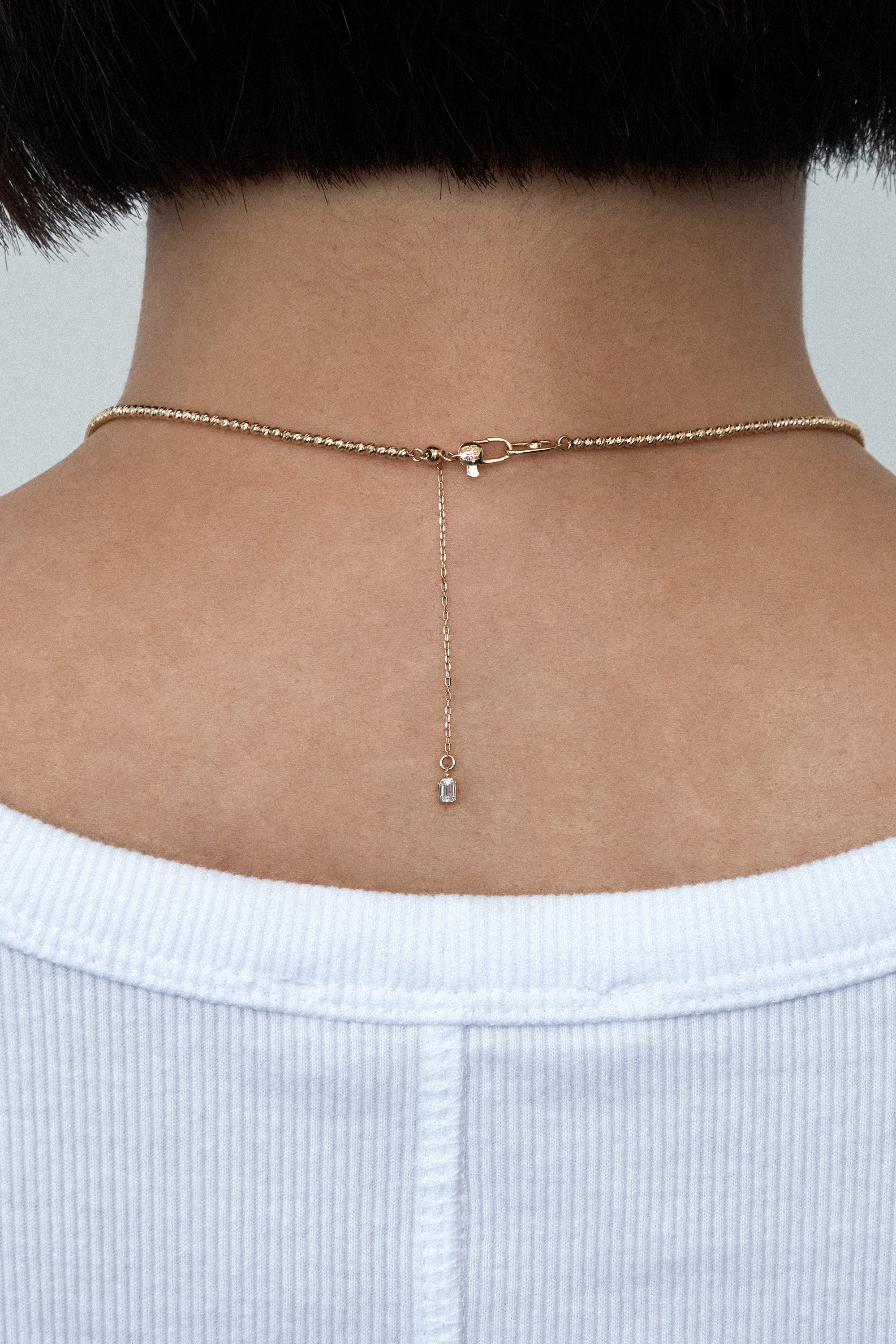 FACETED BALL CHAIN NECKLACE IN GOLD