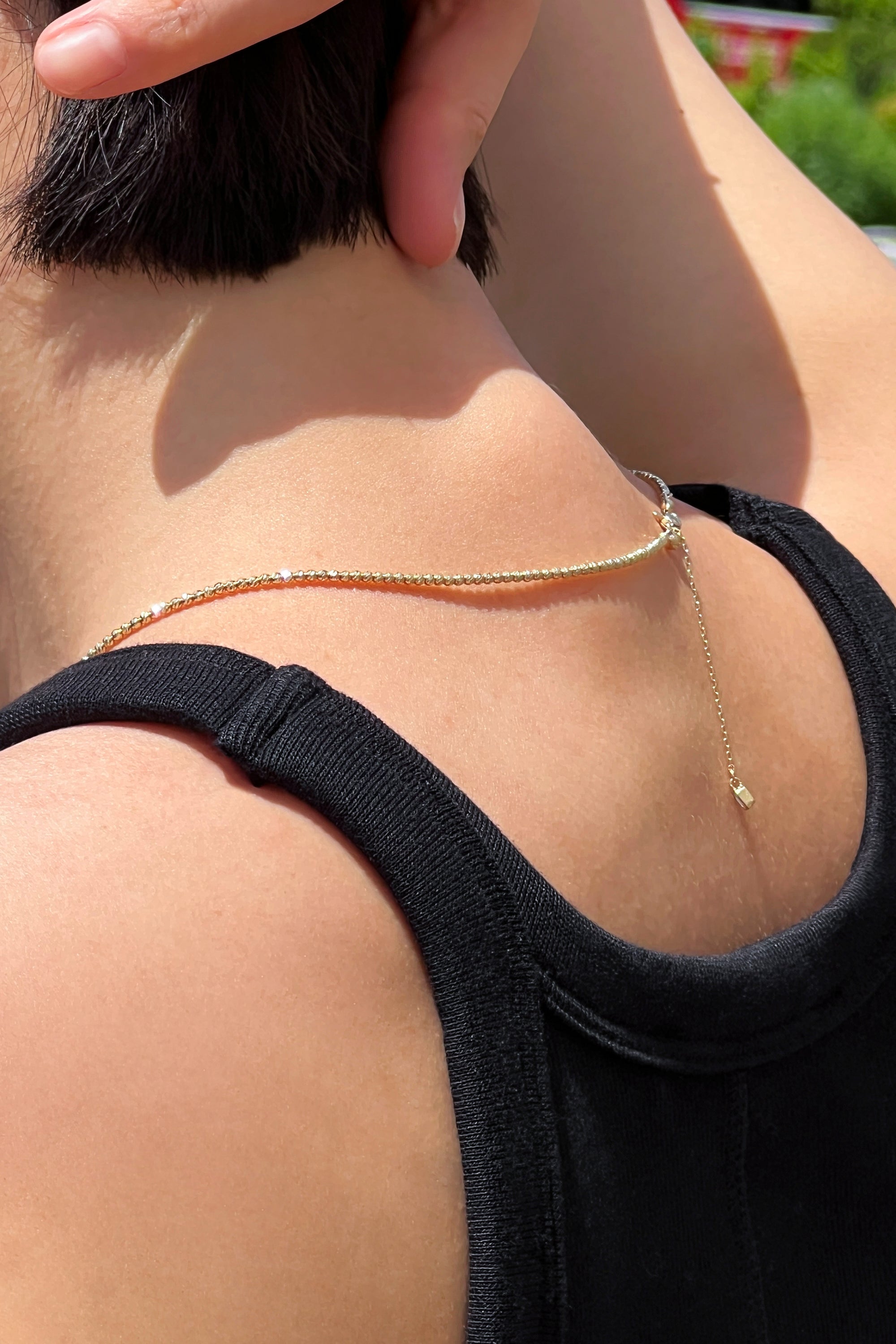 FACETED BALL CHAIN NECKLACE IN GOLD